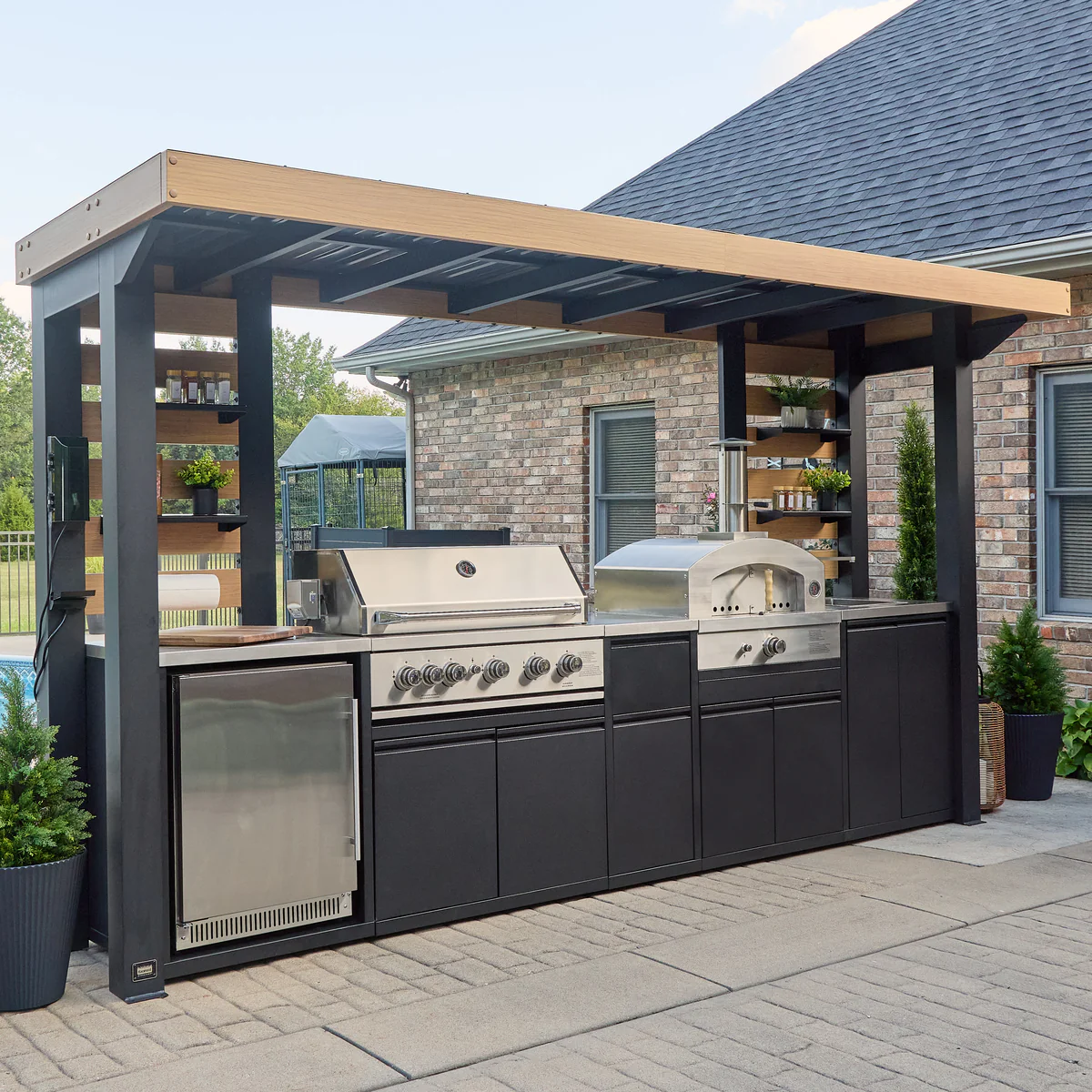 Premium outdoor kitchen beneath modern pergola